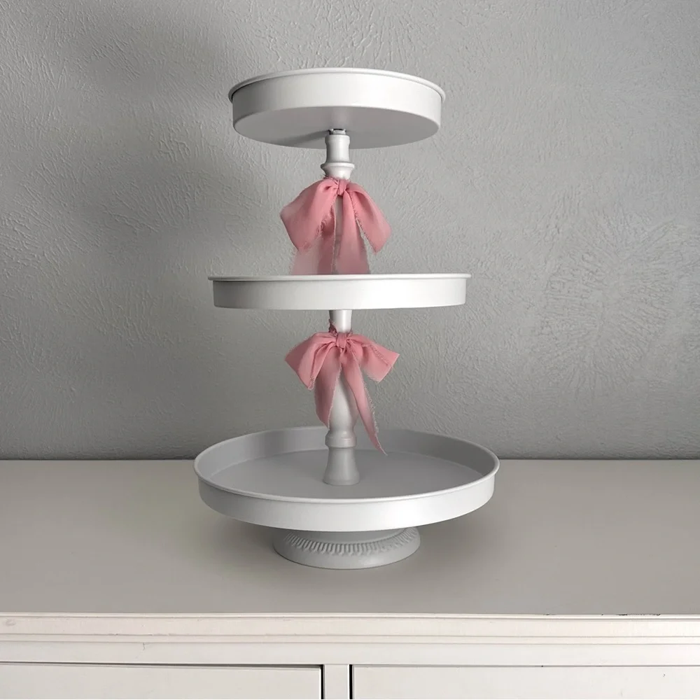 White Three-Tiered Stand with Pink Silk Bow Accents